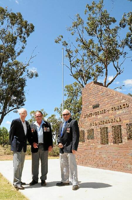 President of the Eumungerie Coboco RSL Sub-branch John MacKenzie, vice president  John Brady and treasurer Frank Dunne at the new cenotaph that will be unveiled in Eumungerie on Remembrance Day on Thursday.