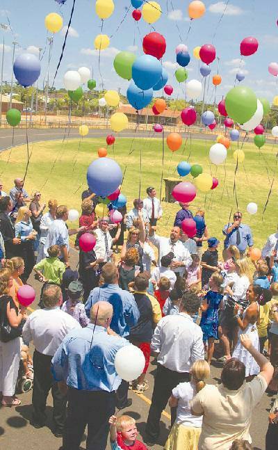 o FREE SPIRIT: The Saul family and friends released 200 coloured balloons at Victoria Park No 1 Oval yesterday to celebrate the life of Brendan, 9, who died in a hit and run accident in Dubbo last week.                                PHOTO: Belinda Soole