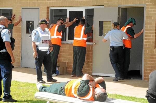 Prison staff remand and execute a search of the 'rogue inmates'.