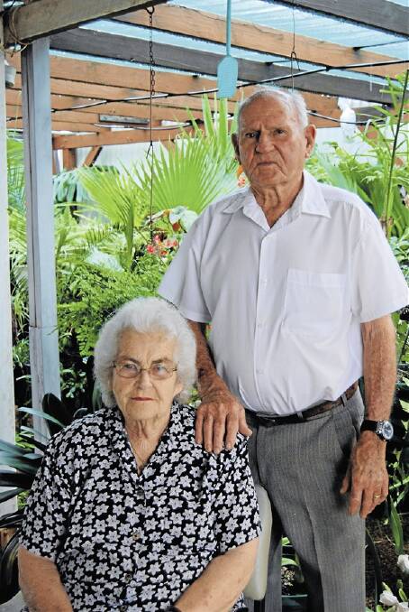 Former prisoner of war Frank Smith and wife Pam at their home at Narromine.          Photo: Sarah Press