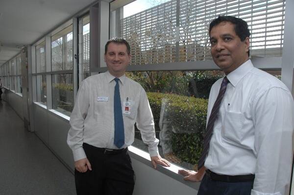 Dubbo Base Hospital general manager Andrew Newton welcomes new Sri Lankan-born surgeon Dr Ruwan Perera to Dubbo. Photo: AMY GRIFFITHS