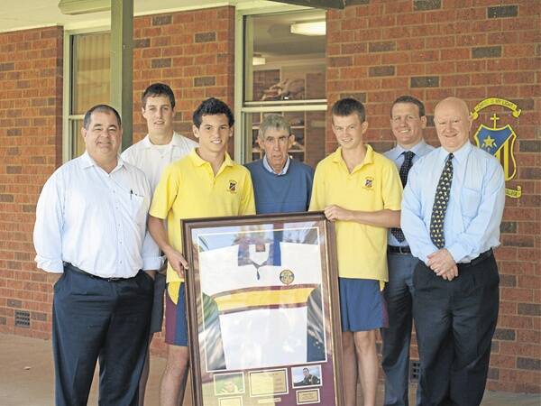 John Walkom, Isaah Yeo, Billy Sing , Paul Fahy, Ben Marlin, Martin Cook and Warren Frew at St John’s College for the jersey presentation.