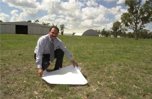 John Kosseris in 2003, with plans for the heritage-listed RAAF Base.