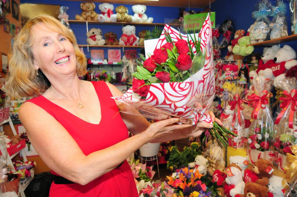 Flowers by Jennifer owner Jennifer Bjorksten preparing for a busy Valentine's Day. Photo: LOUISE DONGES.