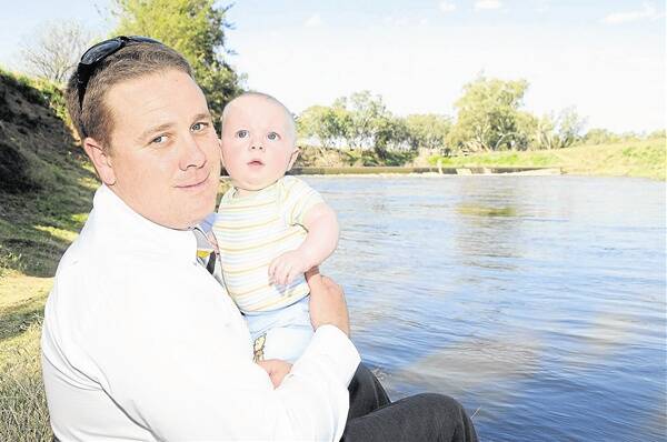 Inland Waterways Rejuvenation Association president Matt Hansen and son Jack dream of a healthy river full of big fish if a fishway was placed at the South Dubbo weir.