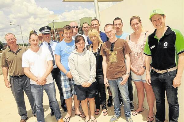 DCC general manager Mark Riley, Sean Basile, Inspector Glenn Cogdell, Jonathan Hill, Peter Ince, Jessica Wilkinson, Daniel Hile, Jessica Hanneley, Michael Dawn, Kyle Murphy, Isaak Pipers, Jamie Gradden and Mayor Mathew Dickerson outside Dubbo Police Station during the recruitment tour.
