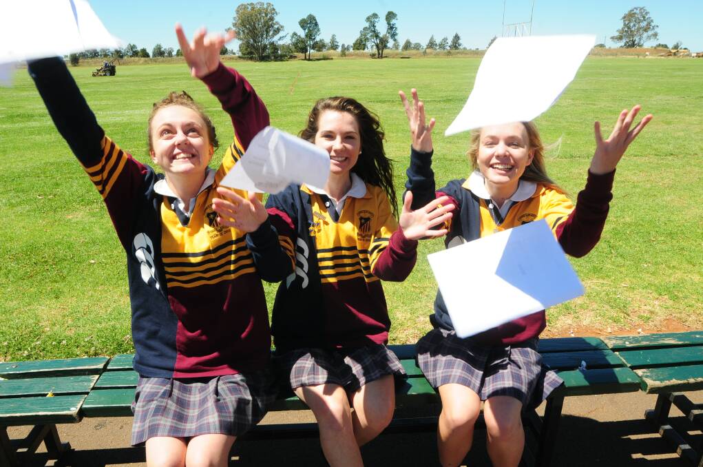 SJC Year 12 PDHPE students Belle Haycock, Amy Armstrong, Emily Hayes happy to finish their examPHOTO: CHERYL BURKE