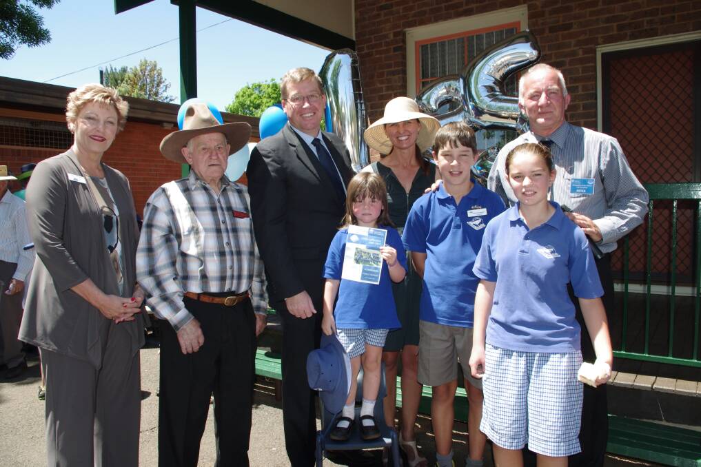 Regional director Carole McDiarmid, oldest past student John Smith, Troy Grant, youngest student Ella Hinchcliffe, Toni Grant, school captain Sam Maljers, principal Peter George and school captain Caitlin Powyer. 					  Photos contributed