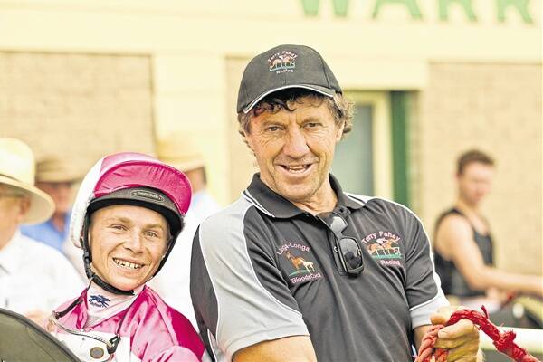 Apprentice jockey Jake Pracey-Holmes and trainer Terry Fahey were all smiles after Old Gold’s win at the Warren Cotton Cup meeting on Saturday.                 Photo: JANIAN McMILLAN (www.racing.photography.com.au)