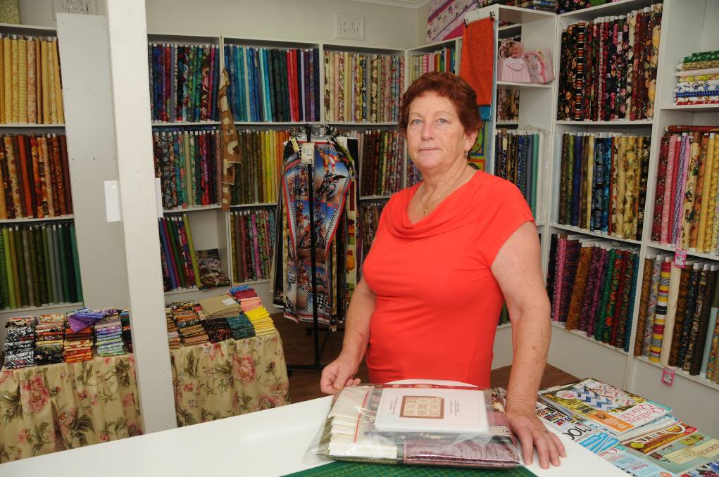 Lesley Morgan at her business, Toongi's Little Quilt Shop, where she was approached by a man trying to scam her. 								   Photo: AMY MClNTYRE
