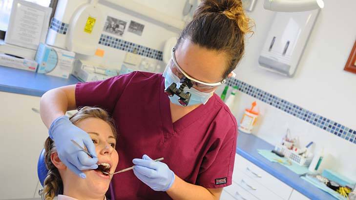 No longer distressed … Taree dentist Nancy Saunders-Clay with patient Annastaice Hanley.