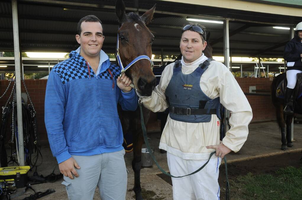 Ben Hagney and Trent Rue with Parc Des Princes after the gelding s win at Dubbo Paceway on Saturday night. 	Photo: CHERYL BURKE
