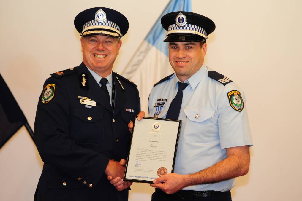 Assistant Commissioner Geoff McKechnie with Sergeant Scott Bolton