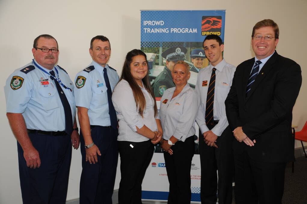 Inspector Alan Cusack and Senior Constable Shane Smith from Orana LAC, IPROWD graduates Ebony Flanders, Shakira Randall and Dominic Seymour and Dubbo MP Troy Grant at yesterday's ceremony. 	Photo: LISA MINNER