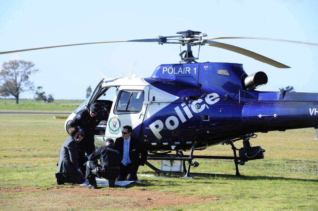 PolAir 1 landed at Dubbo on its way west to search for missing resident Alois Rez. 	Photo: BELINDA SOOLE