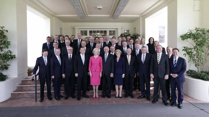 Governor-General Quentin Bryce poses for photos with Prime Minister Tony Abbott and his new ministry at Government House in Canberra on Wedneday. Photo: Alex Ellinghausen