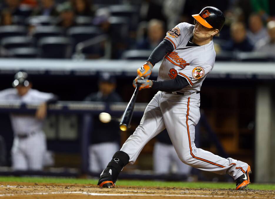 Baltimore s Nate McLouth hits the only home run of the game during game four of his side s series with the New York Yankees.  
Photo: GETTY IMAGES