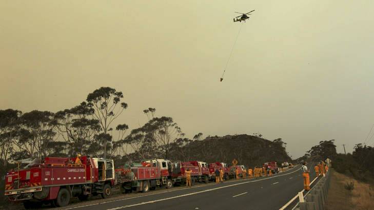 Emergency declared: An RFS team on the Bells Line of Road near Mt Victoria on Sunday. Photo: Dean Sewell