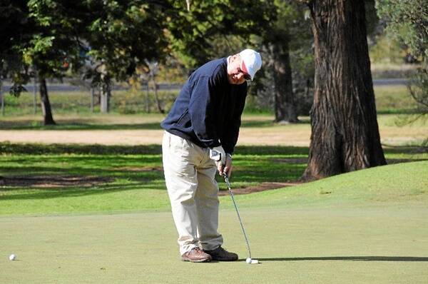 Ray Walton considers his options at Dubbo Golf Club.