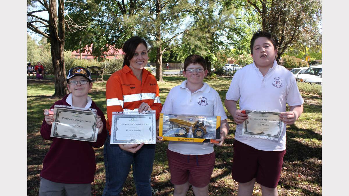 BLAYNEY: Cadia Valley Operation's senior specialist public affairs Melissa Schumacher presented Blayney High School student Shawn Sandry with a certificate and gift of appreciation for his outstanding contribution to the Blayney Festival and CVO Mine Open Day. Other helpers Zac Minnes and Billy Mackie were also thanked.
