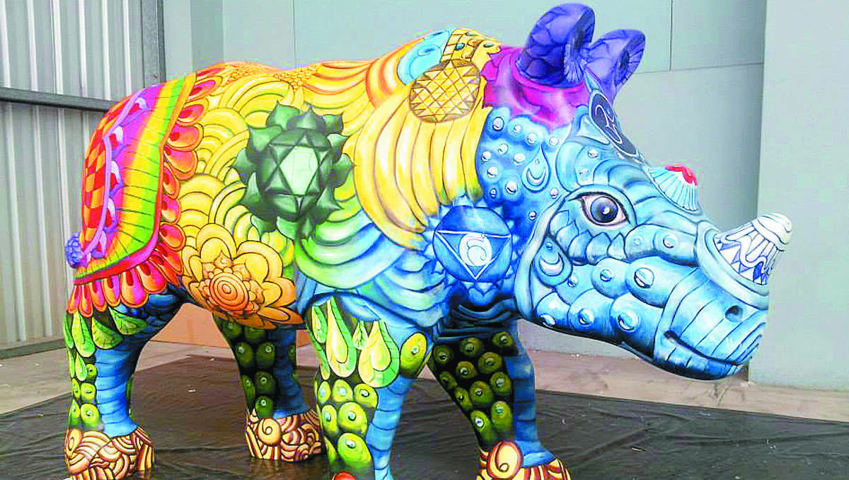KANDOS: Artists Darryl and Kat Brown will have their work displayed in the centre of Sydney starting next month, as part of Taronga Zoo’s Wild! Rhinos Trail.  The Browns have painted one of 120 fibreglass rhinoceroses that will stand in the streets, parks and public spaces of Sydney, Dubbo and surrounds.