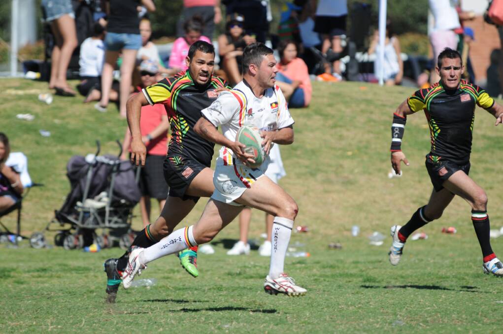 Chris Daley gets into the clear playing for Wiradjuri Spear Chuckers in last weekend's Dubbo Waratahs carnival. Photo: JOSH HEARD