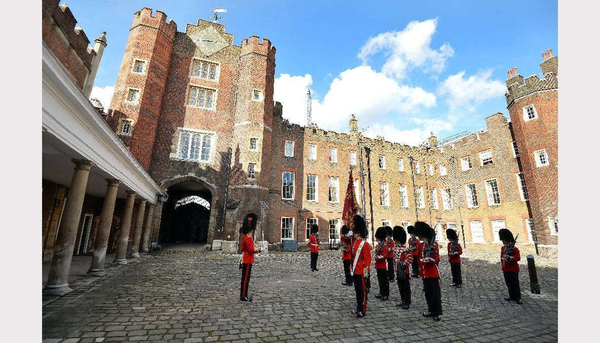 The St James's Palace detachment of The Queen's Guard turns out in Colour Court, St James Palace, for the arrival of Queen Elizabeth II. Picture: Getty