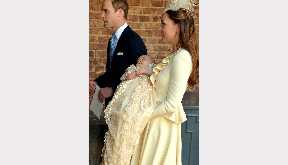 Catherine, Duchess of Cambridge carries her son Prince George Of Cambridge alongside Prince William, Duke of Cambridge, following his christening. Picture: Getty