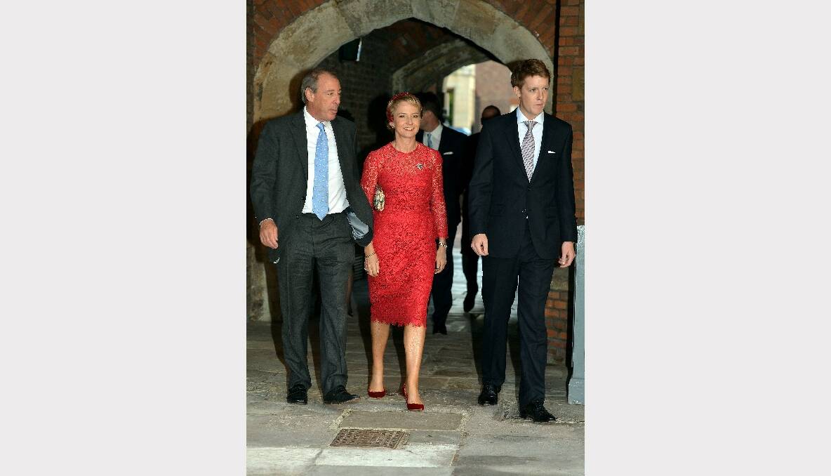 Michael and Julia Samuel arrive with one of Prince George's godparents Hugh Grosvenor (Earl Grosvenor) at the Chapel Royal in St James's Palace. Picture: Getty