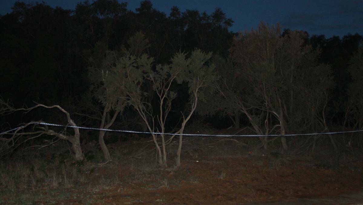 Police were seen cordoning off a section of bushland off Old Coast Road at 5.30pm on Friday in the search for missing teenager Joshua Mcleod..