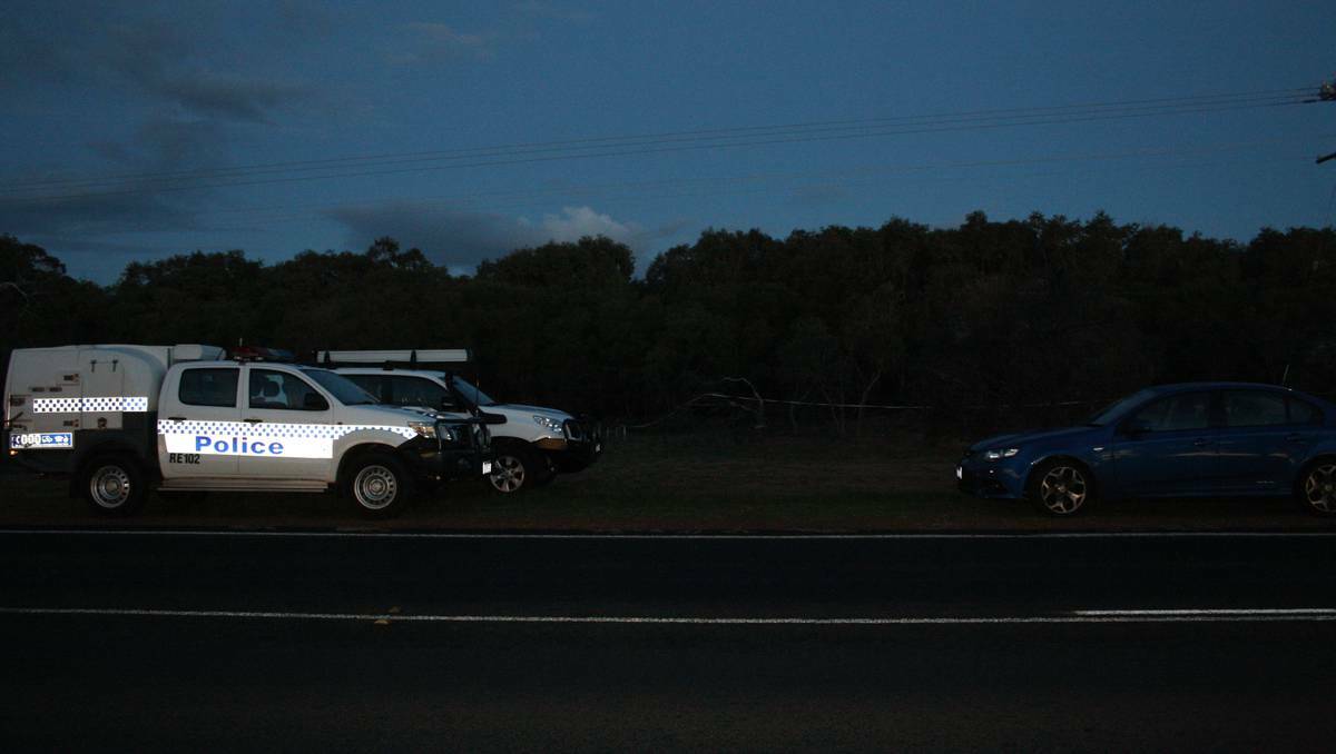 Police were seen cordoning off a section of bushland off Old Coast Road at 5.30pm on Friday in the search for missing teenager Joshua Mcleod.