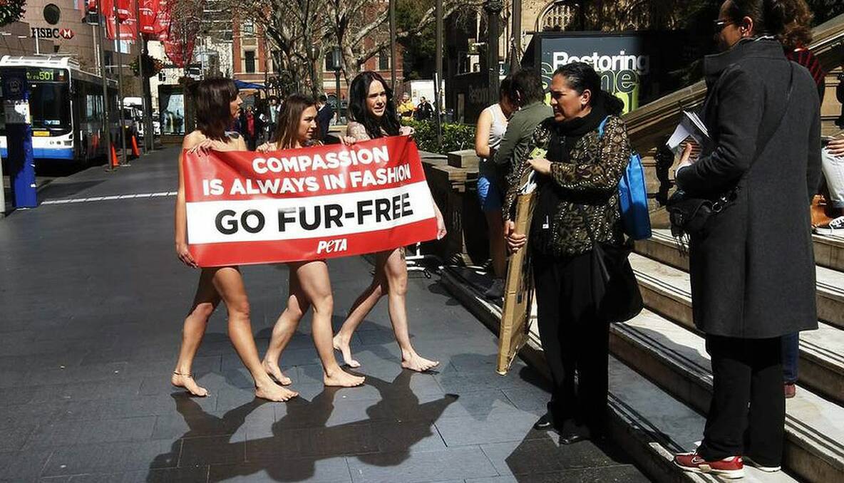 PETA members conduct a protest on limited clothing outside a fashion show at Sydney town hall. Photo: Nick Moir 