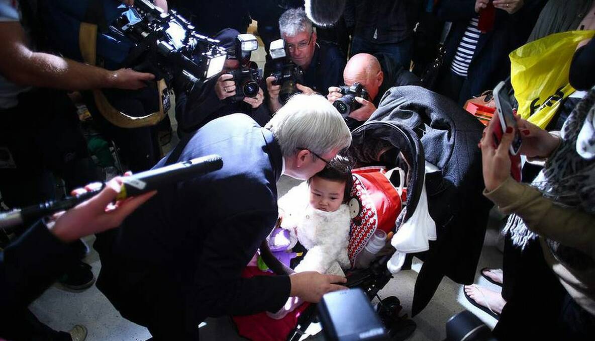 Prime Minister Kevin Rudd kisses 10 mth old Jemima at Westfield Carousel in Cannington in Perth. Photo: Andrew Meares 