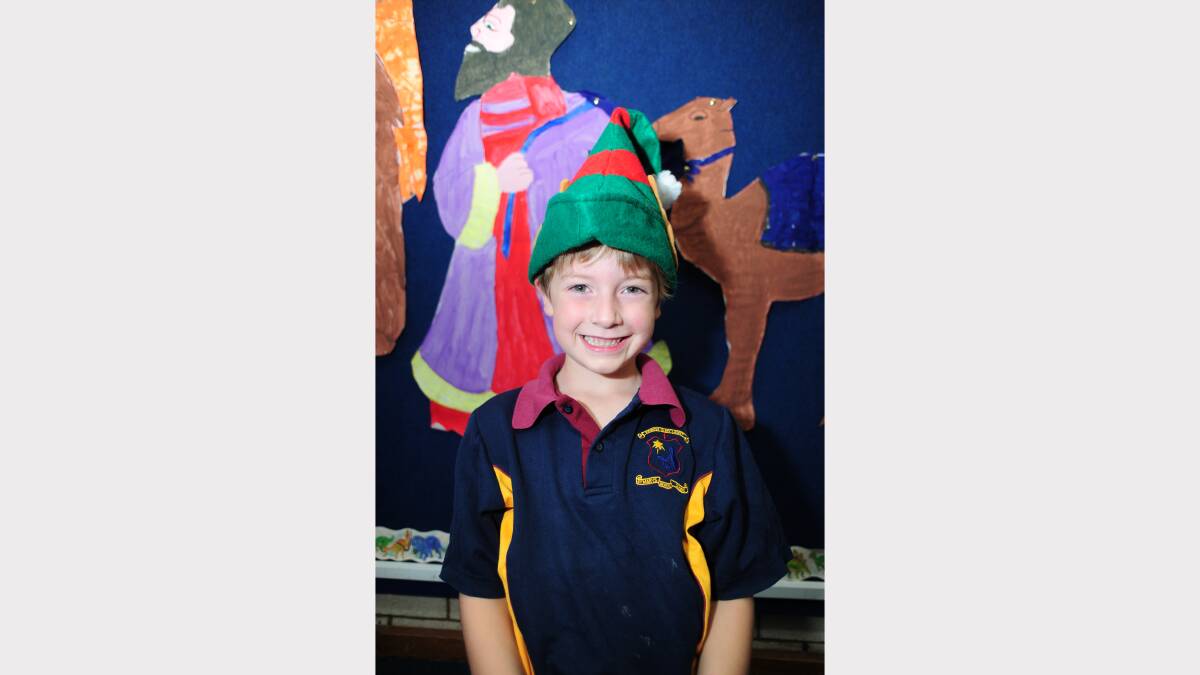 ALL I WANT FOR CHRISTMAS: St Mary's Primary School kindergarten student Declan McGregor would like a Power Ranger gun. 