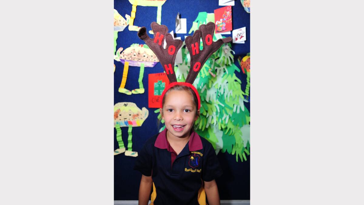 ALL I WANT FOR CHRISTMAS: St Mary's Primary School kindergarten student Zakiah Jenkins would like an ipad
