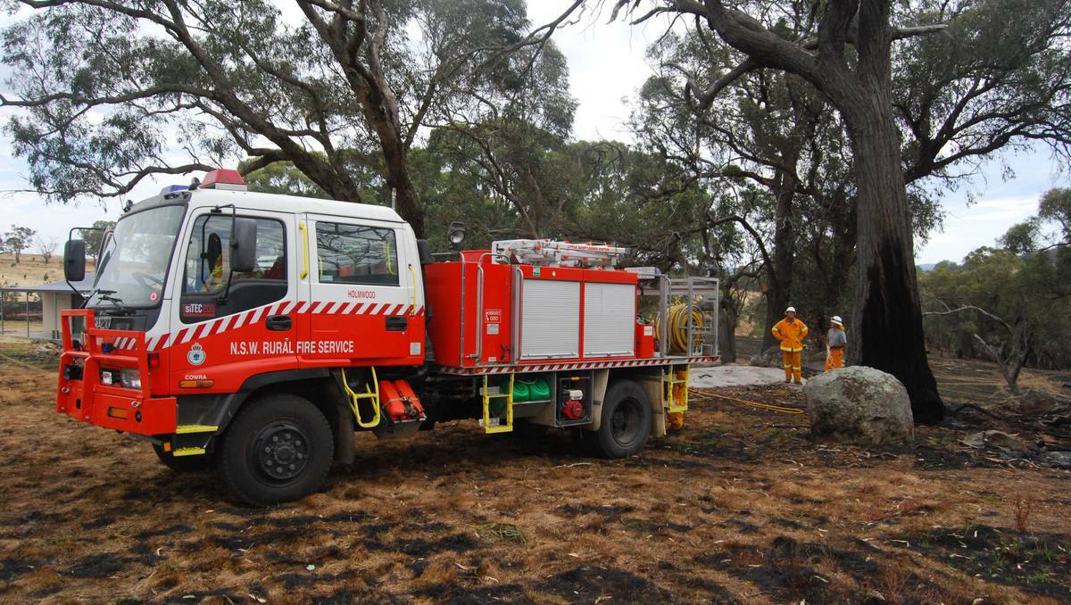 Firefighters deal with treacherous conditions on Sunday. File Photo. 