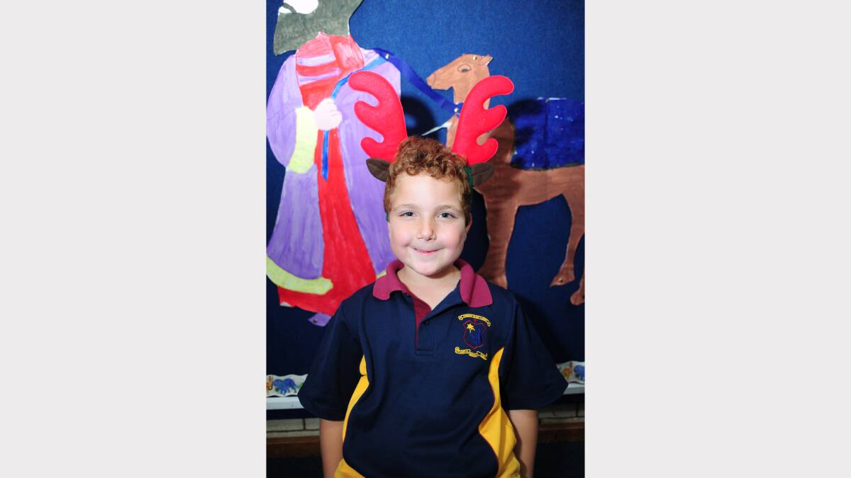 ALL I WANT FOR CHRISTMAS: St Mary's Primary School kindergarten student Clayton Turner would like a motorbike. 