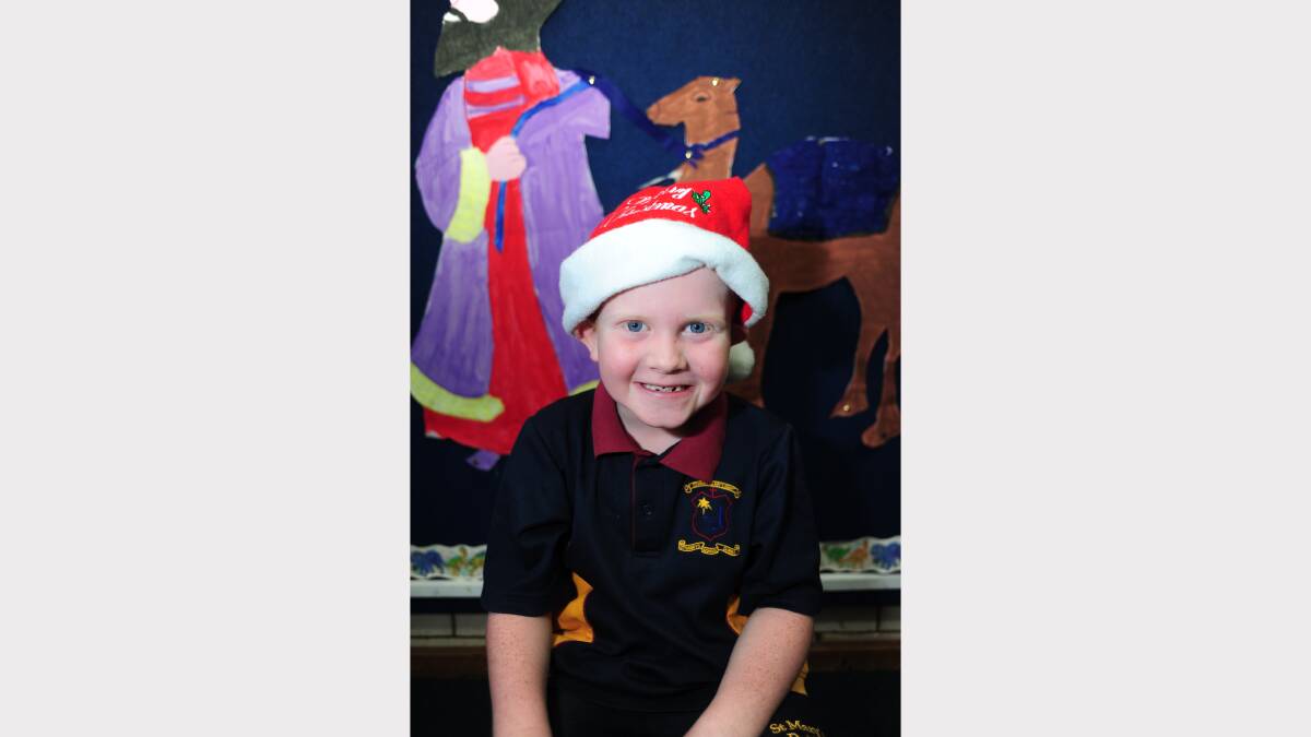 ALL I WANT FOR CHRISTMAS: St Mary's Primary School kindergarten student Dylan Quade would like an ipad, Skylander giants game and a remote control helicopter. 