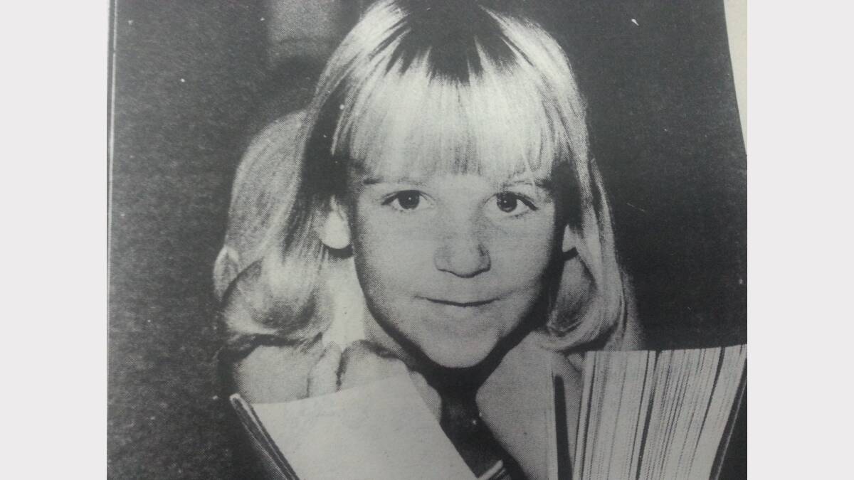#THROWBACK THURSDAY: Joanne Bleakmore (6) with her nose in a book on the history of Australia. Photo: Ken Caines. 