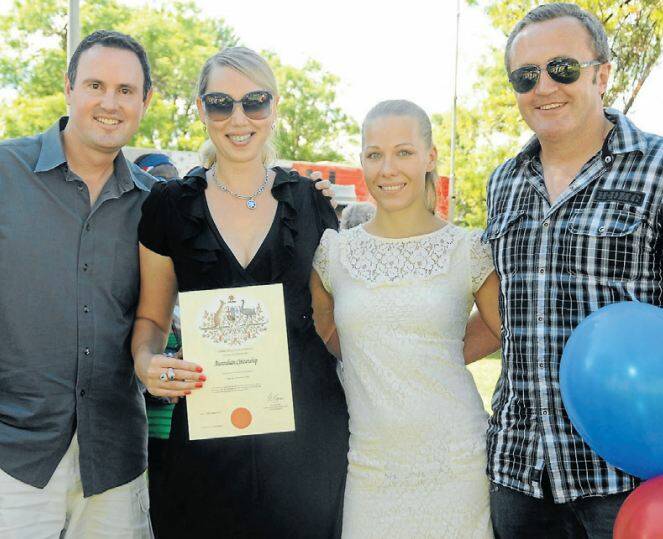 AUSTRALIA DAY HONOURS  2013: Andrew and our new citizen Tatiana Elliot with Anne and Trevor Jones. Photo: KATHRYN O’SULLIVAN