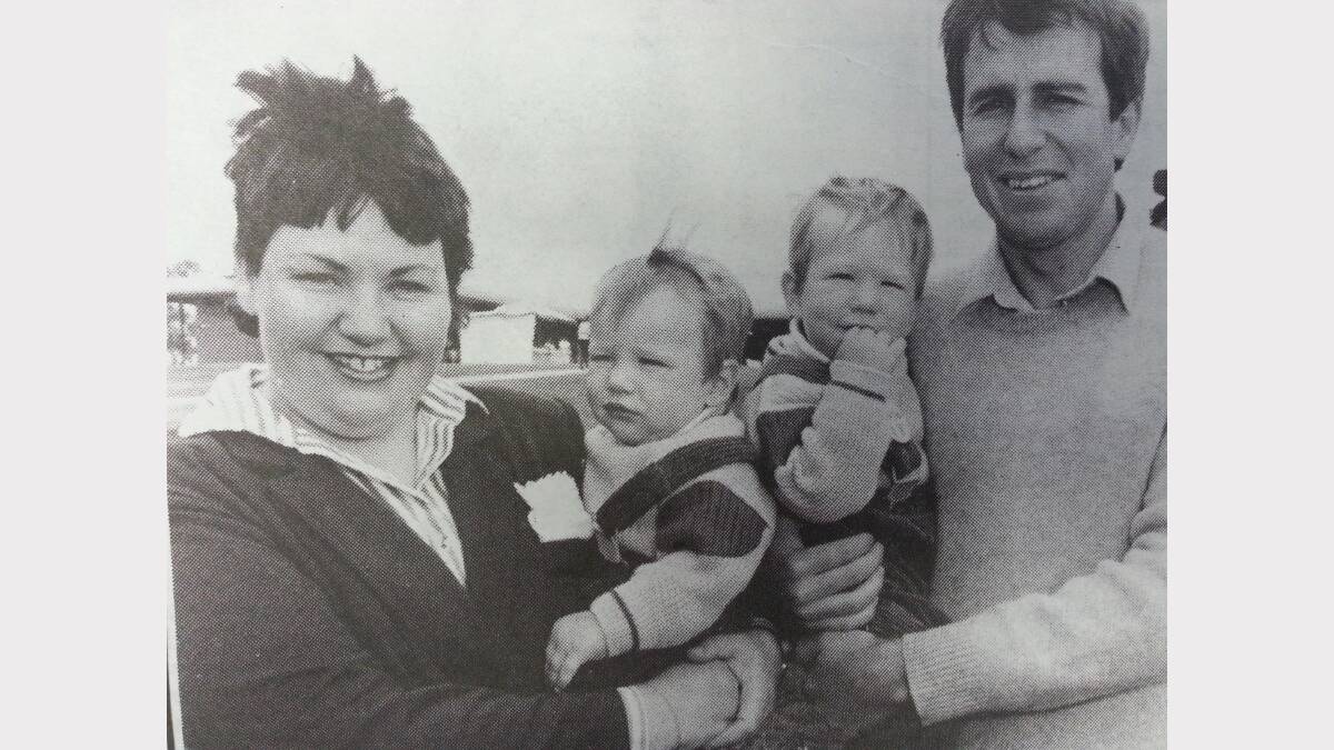 Judy and Rob Armstrong holding their sons Joel and Jamie. 