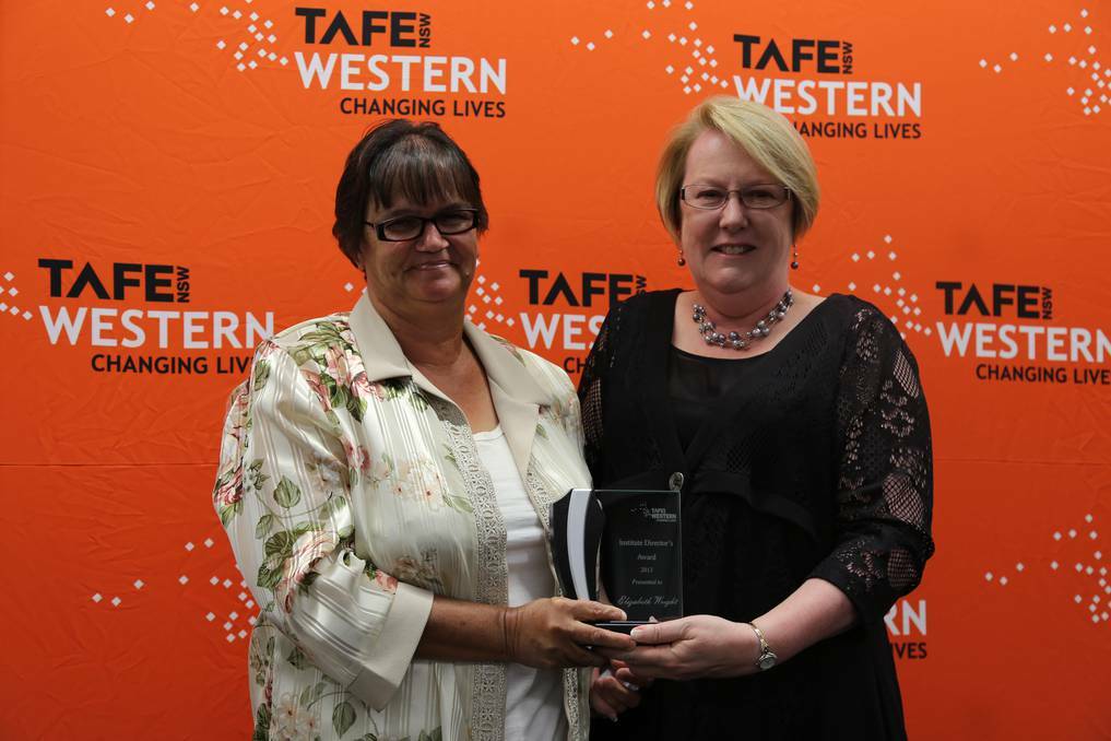Members of TAFE Western's Dubbo College have been recognised for their hard work and achievements, named as winners in the 2013 Institute Director's Awards.Elizabeth Aunty Beth Wright is given her award for Achievement by an Individual, by TAFE Western Institute Director Kate Baxter. Photos contributed