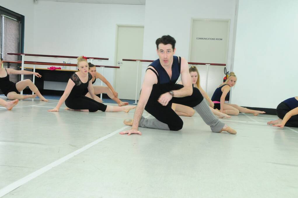The Australian Ballet's Ben Davis workshopping with dance students at the Orana Dance Centre. Photo: KATHRYN O'SULLIVAN