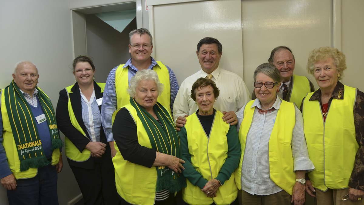 LITHGOW: Member for Calare John Cobb (centre) was confident of victory when he shared smiles with his Lithgow campaign workers Roy Pearce, Janet O’Brien, Peter Pilbeam, Joy Brown, Kaye Martin, Lorraine Taylor, John Martin and Coralie Giles