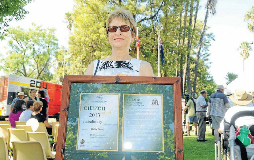 AUSTRALIA DAY HONOURS  2013: Kathy Furney with her Citizen of the Year plaque. Photo: KATHRYN O’SULLIVAN