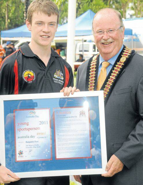 AUSTRALIA DAY HONOURS 2011: Year 11 student Ben Bunt receives his award from Dubbo mayor Allan Smith yesterday. The Young Sportsman of the Year award is another to add to the hard-earned pile of the rising star’s.