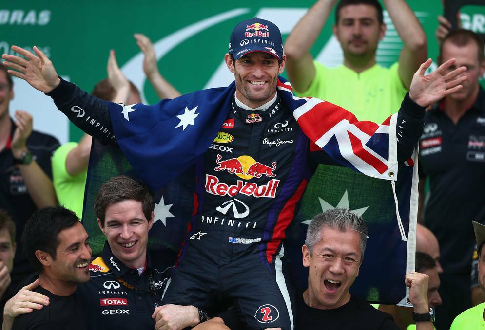 ON HIS WAY: Mark Webber gets carried off following his final Formula One race in Brazil. His new drive at Porsche will see him take on the Bathurst 12 Hour in 2015. Photo: GETTY IMAGES