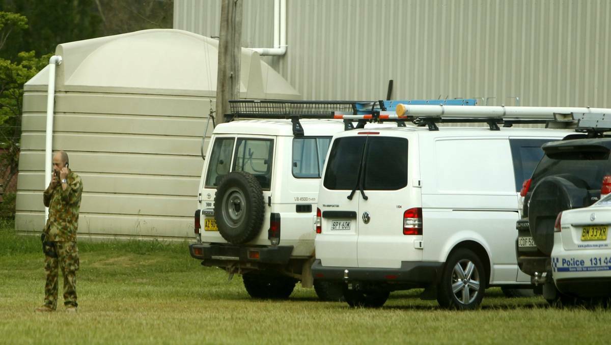 Fairfax images of the hunt for Malcolm Naden which spanned between Nowendoc and Gloucester involving specialist police.
