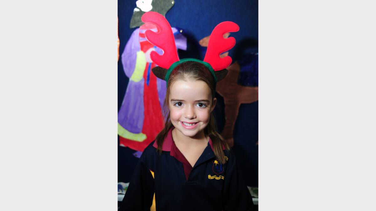 ALL I WANT FOR CHRISTMAS: St Mary's Primary School kindergarten student Tilly Wilson would like a Furby Boon, runners and a tower. 