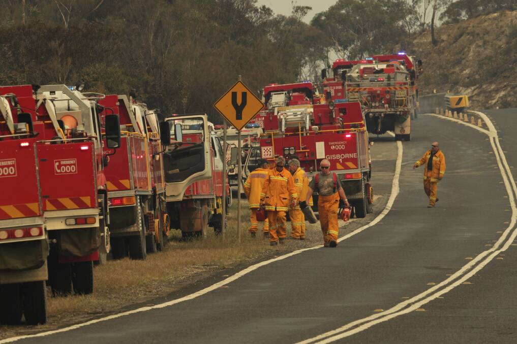 An Rural Fire Service strick team converge on Bells Line of Road near Mt Victoria. Photo: Dean Sewell